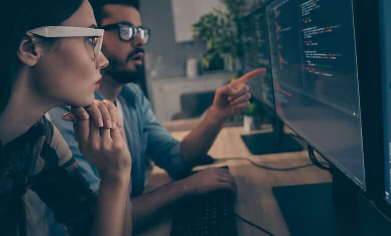 software engineers monitoring enterprise IT systems