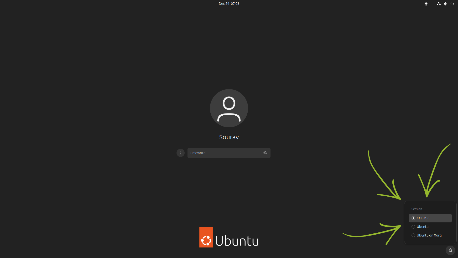 Esta es una imagen de la pantalla de inicio de sesión de Ubuntu, el conmutador de sesión es visible en la esquina inferior derecha con tres flechas verdes apuntando hacia él.