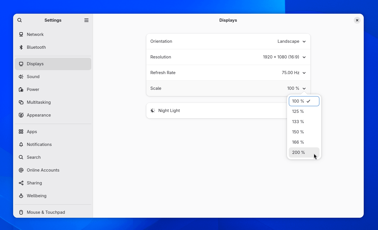 El menú de configuración de pantalla se muestra aquí sobre un fondo azul, con el menú desplegable de zoom visible que muestra varios números porcentuales, como 100, 125, 133, 150, 166 y 200.