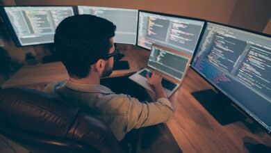 Developer workstation showing multiple coding environments reflecting growing open-source dependency complexity in AI-assisted development